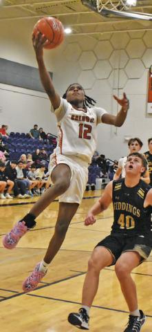 CALDWELL’S JADEN Hagan leaps high for this shot against Giddings last Friday. Tribune photo by Roy Sanders