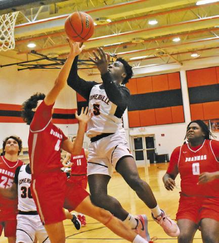 SOMERVILLE’S KEITH CRAWFORD takes a shot against Bellville. See story inside.