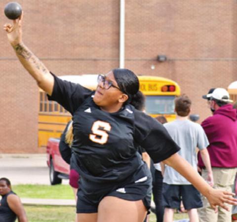 MARTASIA WATKINS of Somerville competes in the shot put at Koppers Relays.