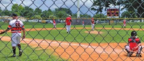THE DEANVILLE REDS 10U Pony League baseball team played in the Mustang 10U Zone Tournament last week. The team is pictured warming up for its game against La Porte Orange on Thursday.