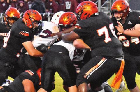 THE SOMERVILLE YEGUAS defense makes a tackle against Iola last Friday in Somerville. The Yeguas improved to 3-3 overall.