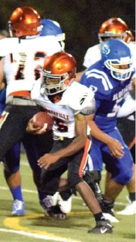 SOMERVILLE’S VERKOBE WOODBERRY runs through the line for a big gain during Friday night’s Snook-Somerville game at Allen Academy. -- Tribune photo by Denise Hornaday
