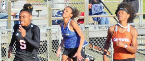 SOMERVILLE’S CAMIA MARTIN flies down the track to win the girls varsity 100-meter dash at the Happy Skrabanek Relays in Caldwell on Friday. Caldwell’s Ja’Asia Mathis placed fourth.