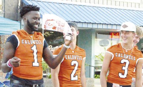 CALDWELL HORNET FOOTBALL players are recognized during last Saturday night’s “Meet the Hornets” in downtown Caldwell.