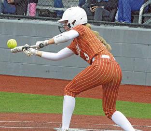 MOLLY MEADOWS bunts during the Caldwell-Robinson area playoff game last Thursday at Georgetown High School. Tribune photo by Denise Squier