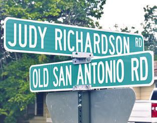 THIS STREET SIGN honoring Judy Richardson was recently placed at its intersection with OSR. Richardson was a noted business owner and civic leader in Caldwell.