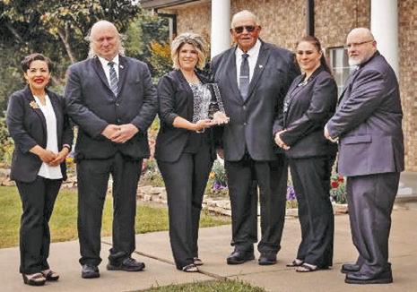Pictured from left to right are Michelle Gallegos, David Trcalek, Marci Reat, Bill Sargent, Elizabeth Duvall, and Ken Wiltz.