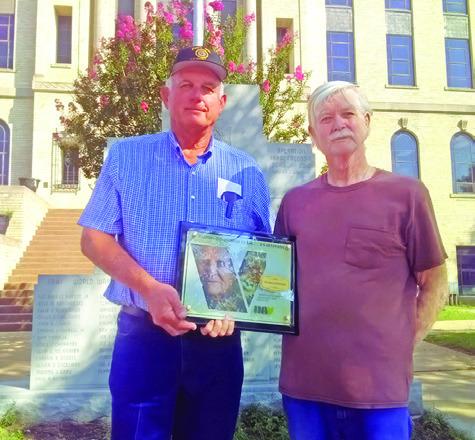 COMMANDER CHARLES REED of Disabled American Veterans Chapter 200 Bryan presents this plaque to Franklin Karasek, Service Officer of Burleson County Chapter 86, for Chapter 86’s 75 years of service assisting veterans and their families. Photo courtesy of Franklin Karasek
