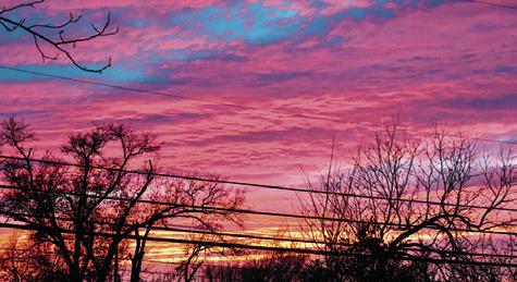 THIS SUNSET WAS visible at dusk on Wednesday, Jan. 29, from the west sky. Local residents and motorists enjoyed the view.