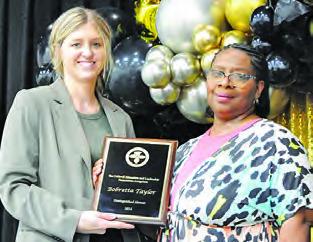 CELF PRESIDENT Krista Zwernemann presents Bobretta Taylor was the Distinguished Alumi Award during last Friday’s Bright Stars Breakfast. -- Tribune photo by Denise Squier