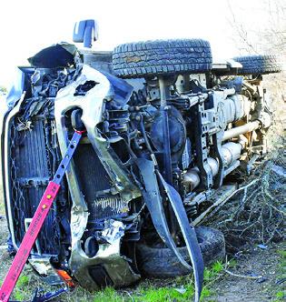 THIS TRUCK IS damaged on Monday in a fatal accident off County Road 123. Tribune photo by Roy Sanders