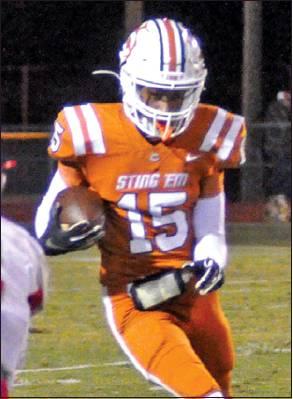 LARRY DAVIS of Caldwell carries the ball against Bellville last Friday. The Hornets lost 27-7 to fall to 2-6 overall and 0-3 in district.
