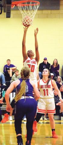XADRIA MARTIN shoots the ball during the Lady Yeguas’ bi-district playoff win over Thrall. -- Tribune photo by Denise Hornaday