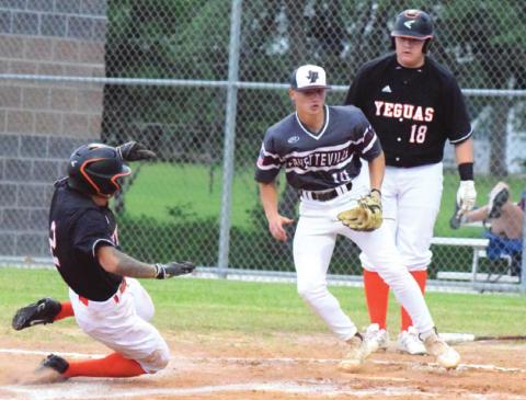 SOMERVILLE’S JEREMIAH TEAGUE slides into home plate as teammate Cullen Sablatura looks on. The Yeguas lost to Fayetteville. -- Tribune photo by Denise Squier