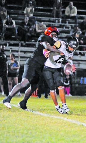 KEKE DANIELS of Somerville defends against this pass against Buda Johnson.