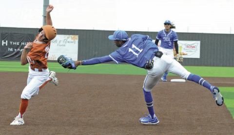 DANIEL BARDIN OF Caldwell avoids this tag at third base last Saturday in the 13-0 home victory over Manor New Tech. -- Tribune photo by Denise Squier