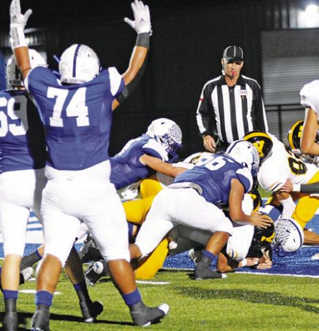 J. BEAUX HRUSKA runs for a score as Gabe Martinez raises his hands signaling touchdown. -- Tribune photo by Denise Squier