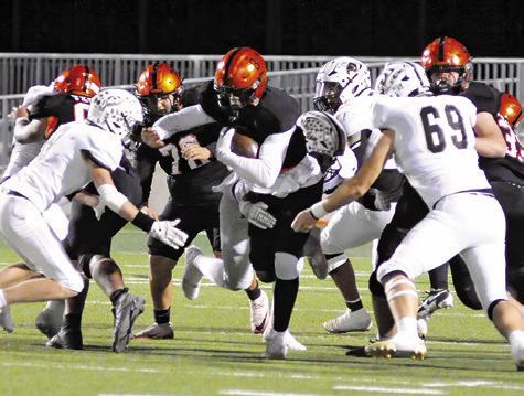 JA’ KEITH DANIELS RUNS for some tough yardage against Junction in Friday’s third round playoff game in Pflugerville. Tribune photo by Denise Squier