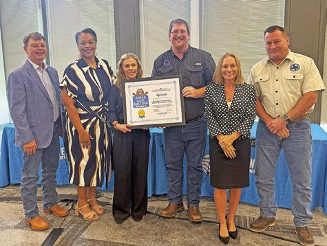 POST OAK SAVANNAH Groundwater Conservation District was recently named as a 2025 Texas Rain Catcher Award winner by the Texas Water Development Board. Pictured, from the left, are Gary Westbrook, TWDB Chairwoman L’Oreal Stepney, Jaclyn Wise, Michael Redman, TWDB Director Tonya Miller and Jeff Fisher.