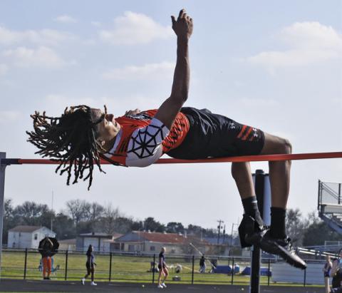 SOMERVILLE’S JEREMY VELA JUMPS at the Bluejay Relays in Snook last Thursday, setting a new Somerville High School record for the boys high jump with a leap of 6 feet 10 inches. Tribune photo by Roy Sanders