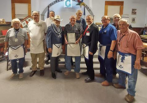 DURING A MASONIC MEETING, ROBERT “Bob” Ware was honored for his service as a Mason and for his service to Lee Scott Lodge.