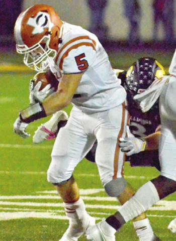 CALDWELL’S JACE ALY carries the ball against McGregor in the Hornets’ final game in McGregor. Caldwell lost 53-14.