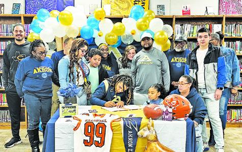 CALDWELL’S DELVIN MORRIS RECENTLY signed his letter of intent to play football for the University of Akron in Ohio, celebrating along with family, friends and coaches.