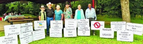 THESE 17 SIGNS WERE on display in Davidson Creek Park during Sunday’s ice cream social, sponsored by the Burleson County Democrats.
