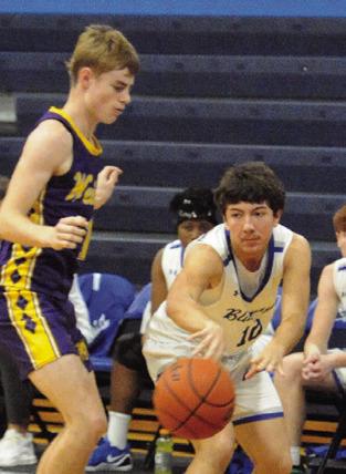 BRAEDYN FANNIN passes the ball against Weimar. Snook won 52-35. Tribune photo by Denise Squier
