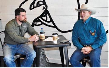 BURLESON COUNTY SHERIFF Bill Rios talks to Ty Eller, the county’s emergency management coordinator, during Coffee With A Cop on Monday, Jan. 12, at Connect Coffee in Caldwell.
