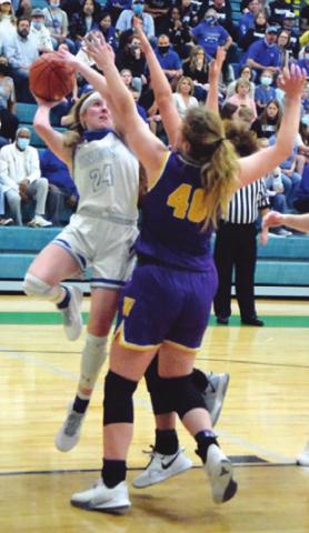 JAYCIE BRISCO shoots over Weimar’s Kennedy Koehn in the Lady Jays’ regional quarterfinal win. -- Tribune photo by Denise Squier