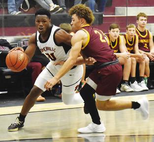 JA’KEITH DANIELS dribbles the ball around this Thorndale defender at the tournament. Tribune photo by Roy Sanders