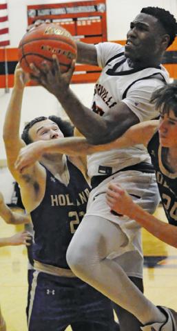 JA’KEITH DANIELS takes a shot against Holland. The Yeguas won 64-15. Tribune photo by Denise Squier