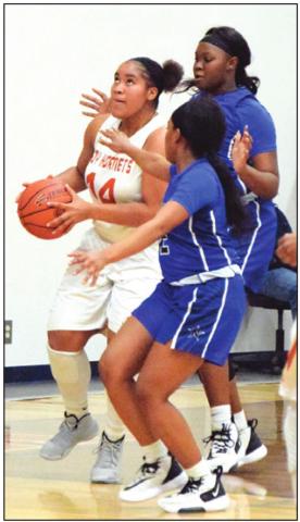 AALAYIAH JONES looks to shoot the ball during Caldwell’s home game against Navasota. Jones was the team’s top scorer with eight points. -- Tribune photo by Denise Hornaday