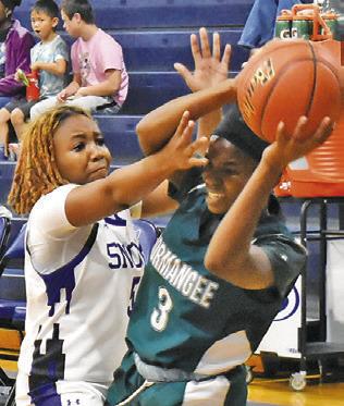 BRAYNIJA POOL DEFENDS the pass during the Snook-Normangee game last Friday. Tribune photo by Roy Sanders