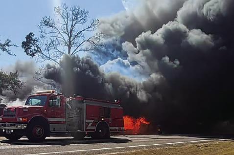 BLACK SMOKE EMERGES from this fire off Park Road 4. Photo courtesy of the Burleson County Sheriff’s Office