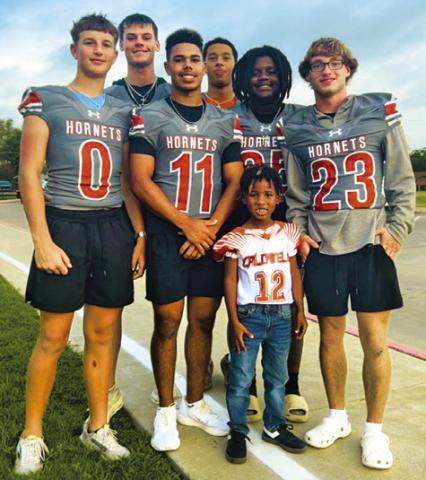 CALDWELL HIGH SCHOOL football players welcomed the district’s “Little Hornets” to the elementary campus on Friday.
