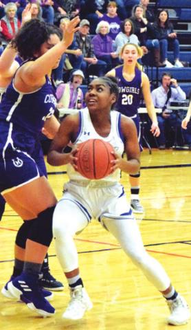 JAIVAN STRINGFELLOW looks to shoot during Snook’s area playoff loss to Mason on Friday. -- Tribune photo by Denise Hornaday