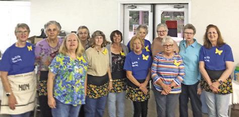 THE LYONS EXTENSION CLUB hosted their annual Spring Fling Plant/ Craft Sale on Saturday, March 28, at Harmony Baptist Church between Caldwell and Lyons. Pictured are Fran Gore, Sande Ober, Linda Pollard, Terri Sissom, Cathy Moore, Eileen Barnes, Claudia Pittman, Charlene Mueller, Peggy Robinson, Phyllis Koenig, Carolyn Brinkman and Debbi Schumacher. Photo courtesy of the Lyons EEA