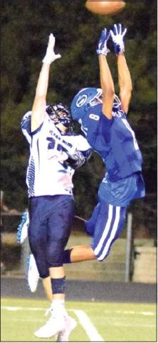 SNOOK’S DRE’RAUD Rogers tries to intercept a pass during the Snook-Texas Wind game Friday. -- Tribune photo by Denise Hornaday