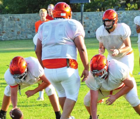 SOMERVILLE QUARTERBACK LORENZO Vega prepares for the snap as linemen Ross Dubois and Riley Eldridge get ready to block. Alejandro Espinoza is on defense. -- Tribune photo by Roy Sanders
