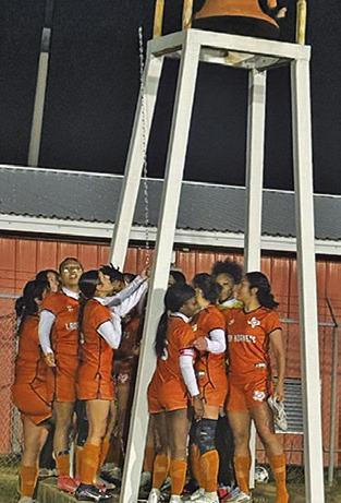 Lady Hornets ring bell with 1st district win