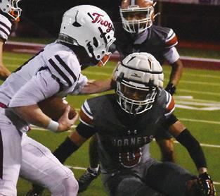 ROGELIO HERNANDEZ of Caldwell moves in for a tackle against Troy. Tribune photo by Roy Sanders