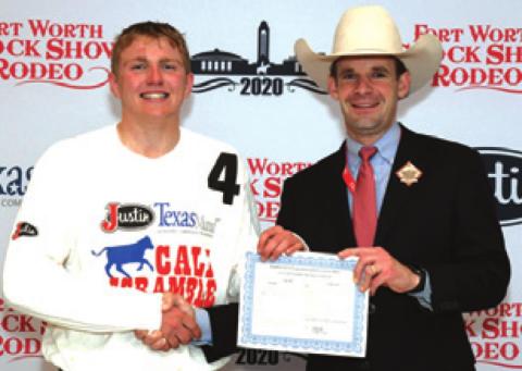 LARAMIE PIEPER won a $500 purchase certificate toward a heifer for exhibition at next year’s Fort Worth Stock Show &amp; Rodeo. He is pictured with Stock Show Calf Scramble Committee Chairman, Paxton Motheral.