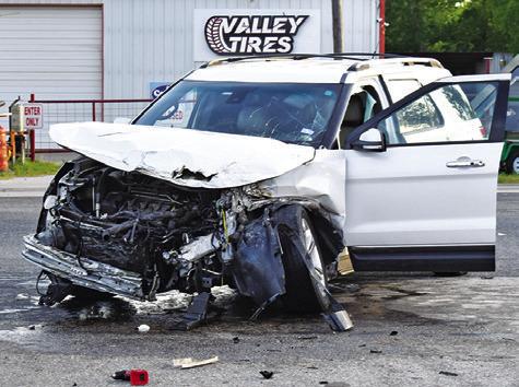 THIS SUV WAS damaged on Wednesday night in a three-vehicle accident at the intersection of F.M. 60 and State Highway 36 South. Tribune photo by Roy Sanders