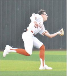 COY BECKA OF Caldwell makes this diving catch for an out against Taylor.