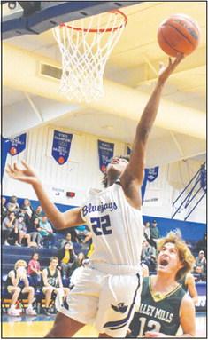 SNOOK’S JIMMY Kearney makes this shot against Valley Mills. The Bluejays lost a close one 54-51. -- Tribune photo by Roy Sanders