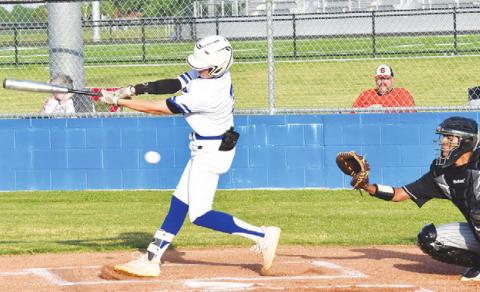 SNOOK’S CADEN SCHLUENS swings at the ball last Friday against Somerville in Snook.