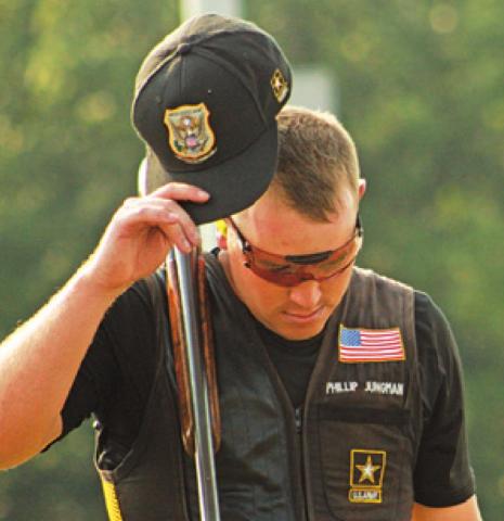 PHILLIP JUNGMAN tips his hat to the crowd during the Men’s Skeet competition at the National Shotgun Skeet Championship. -- Photo courtesy of USA Shooting