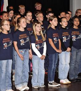 THE CALDWELL Intermediate School Choir performs at the Veterans Day ceremony.